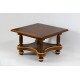 A small wooden table - an antique stool.