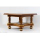 A small wooden table - an antique stool.