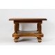 A small wooden table - an antique stool.