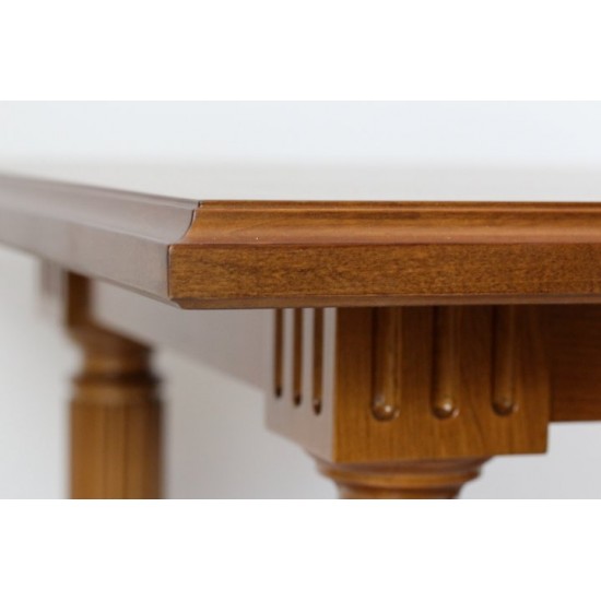 A small wooden table - an antique stool.