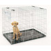 Savic Dog Residence - A plastic pallet in a cage