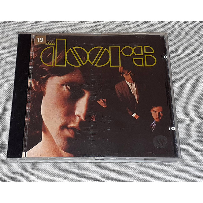 Фирменный The Dооrs - The Doors