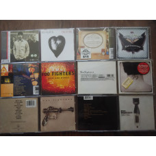 Collection of records of the FOO FIGHTERS group (1 CD, 1 DCD, 1 CD+DVD, signature)