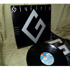 GIUFFRIA 1984 MCA US OIS ~ NM / ~ NM